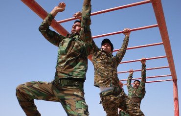 Les députés irakiens suivent les milices alliées à l'Iran avec prudence