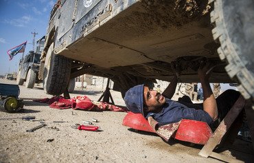 الوحدة الميكانيكية في القوات العراقية تخوض معركتها الخاصة في الموصل