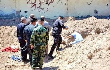 Forensic teams investigate mass graves in al-Rutbah