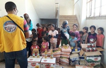 Le Conseil civil d'al-Raqqa joue un rôle majeur dans l'aide aux nécessiteux