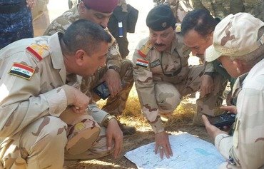 Les forces irakiennes nettoie Moutaibija des poches de l'EIIS