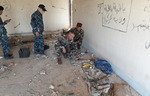 La police irakienne sécurise les villages le long de la route reliant Kirkouk à Bagdad
