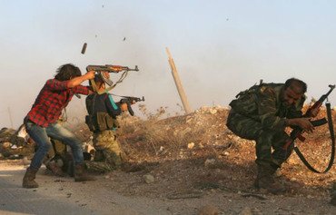 غیرنظامیان حمص و حما در بین طرفین جنگ گرفتار شده اند