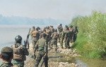 Collaboration entre forces irakiennes et SWAT pour chasser l'EIIS d'Albou Saif