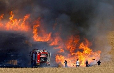 آتش بخش های گسترده ای از زمین های کشاورزی عراق را در بر گرفت