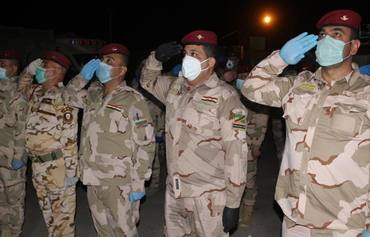 Moment of solidarity in Iraq with coronavirus victims, first responders