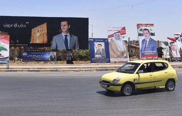 بسیاری می‌گویند که انتخابات سوریه تنها یک مضحکه بوده است