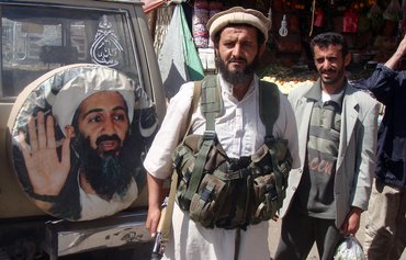 إرث بن لادن المشوه والممزق لا يزال يطارد القاعدة