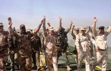Affrontements entre habitants de Mossoul et l'EIIL à l'approche de l'armée irakienne