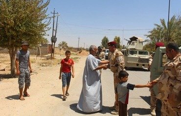 القوات العراقية تحرر عائلات الأنبار المحاصرة من قبل داعش