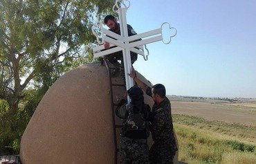 Kurdish forces restore religious harmony in northern Syria