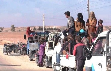 Al-Raqa residents flee as liberation battle looms