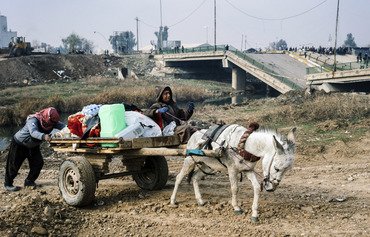 أهالي غربي الموصل يأكلون وجبة واحدة في اليوم ويستعدون للأسوء