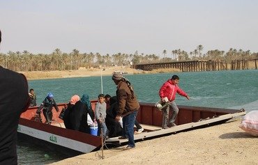 Hundreds of families return to western Anbar