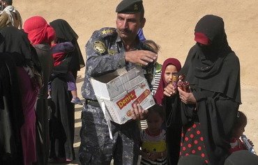 زوجات عناصر داعش يتعاونّ مع الشرطة العراقية