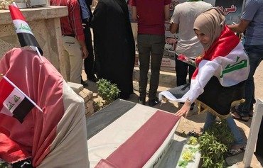 Mosul residents pay tribute to Iraqi soldiers