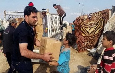 العراق يهيئ مخيماً للنازحين في حديثة