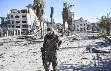Security forces comb al-Raqa after ISIS ouster