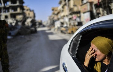 نیروهای دموکراتیک سوریه پیروزی الرقه را گرامی داشتند، اما تحویل آن زمان می برد