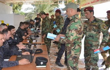 Iraq reinstates dismissed Anbar policemen