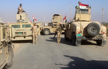 Iraq forces retake last ISIS-held town in country
