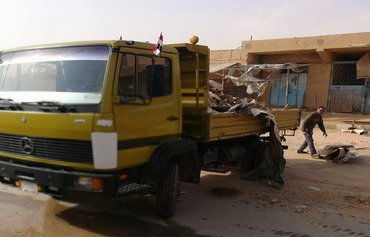 سكان راوة ينظفون مدينتهم من جميع آثار داعش