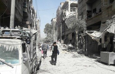 Opposition fighters begin leaving last pocket of Ghouta