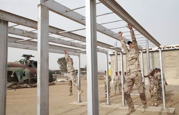 مربیان فرانسوی نیروهای واحد ضدتروریسم عراق را آموزش می دهند
