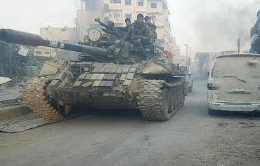 طرفین درگیری در جنوب دمشق توافق نامه آتش بس امضا کردند