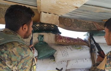 داعش تعدم 30 من عناصرها في بلدة على الحدود السورية