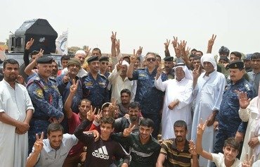 Confiance mutuelle entre les habitants d'al-Hawija et la police