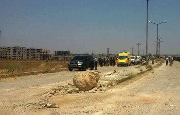 Opposition fighters, families leave Daraa for Idlib