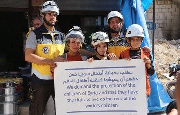 Syria's White Helmets protest regime, Russian attacks