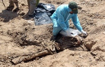 Plus de 200 charniers découverts dans l'ancien territoire de l'EIIS en Irak, selon les Nations unies