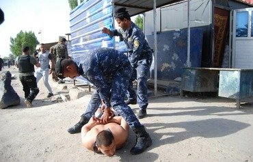 الحكومة العراقية تنقل المسؤوليات الأمنية في المدن المحررة