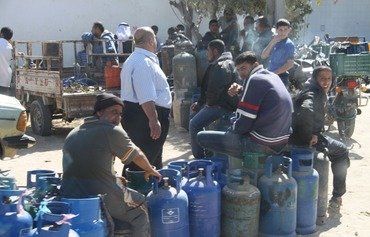 دمشق تواجه نقصا في غاز الوقود وحليب الأطفال