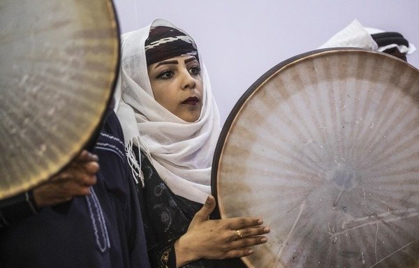 More than a year after ISIS fled al-Raqa, Syrian drummers and dancers are finally back on stage performing for the first time at the newly opened culture and arts centre. [Delil Souleiman/AFP]
