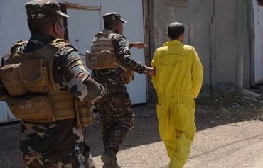 L'Irak maintient les procès des combattants étrangers de l'EIIS