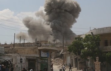 Syrian, Russian strikes kill civilians in Idlib, Hama