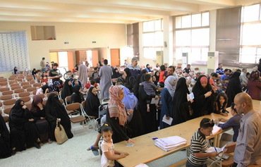 العراق يوسع دعمه الاجتماعي لعائلات نينوى