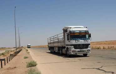 Iraqi forces step up Anbar international road security measures 