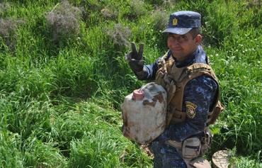 Iraqi police clear explosives left behind by ISIS in Kirkuk