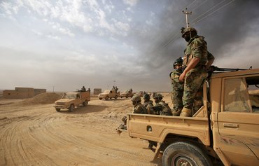 L'Irak demande la restitution de la Syrie des armes pillées par l'EIIS