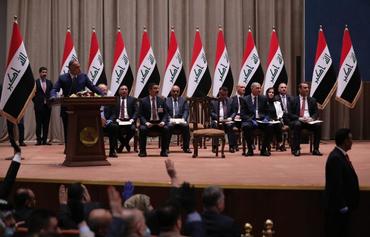 Ex-intel chief becomes Iraq PM amid fiscal, virus crises