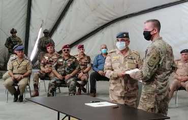 التحالف الدولي يسلم قاعدة التاجي للقوات العراقية