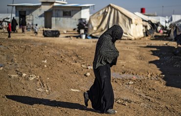 Aid group urges NE Syria access as coronavirus spreads
