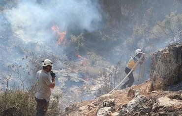 White Helmets contain fires in Idlib province