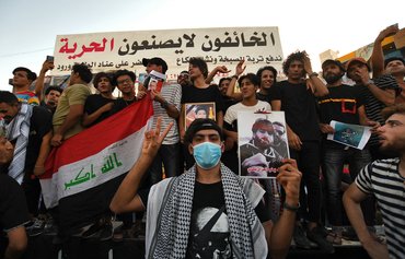 آلاف العراقيين يتظاهرون احتجاجا على القتل بلا عقاب