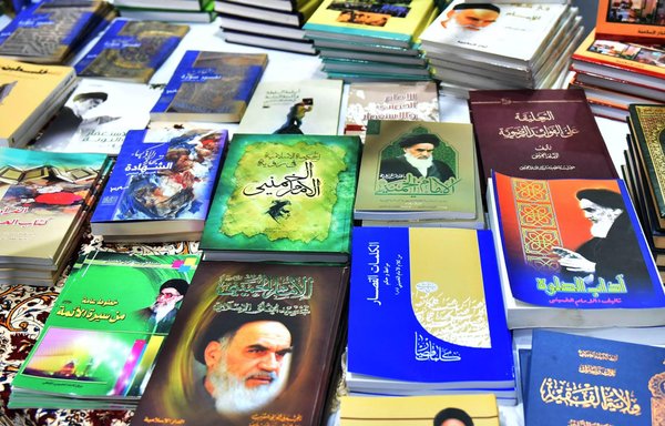 Hizbullah-affiliated and Iranian publishing houses display books about Islamic Republic and IRGC leaders at the Beirut Arab International Book Fair. [Ziad Hatem]