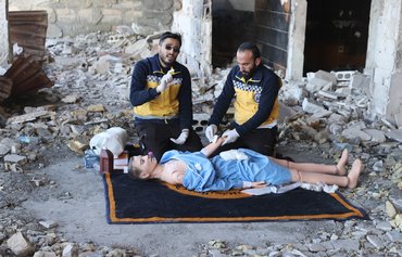 Syria White Helmets film first-aid tutorial for Ukraine rescuers